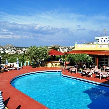 Karavos Hotel Apartments อาร์คานเยโลส ภายนอก รูปภาพ