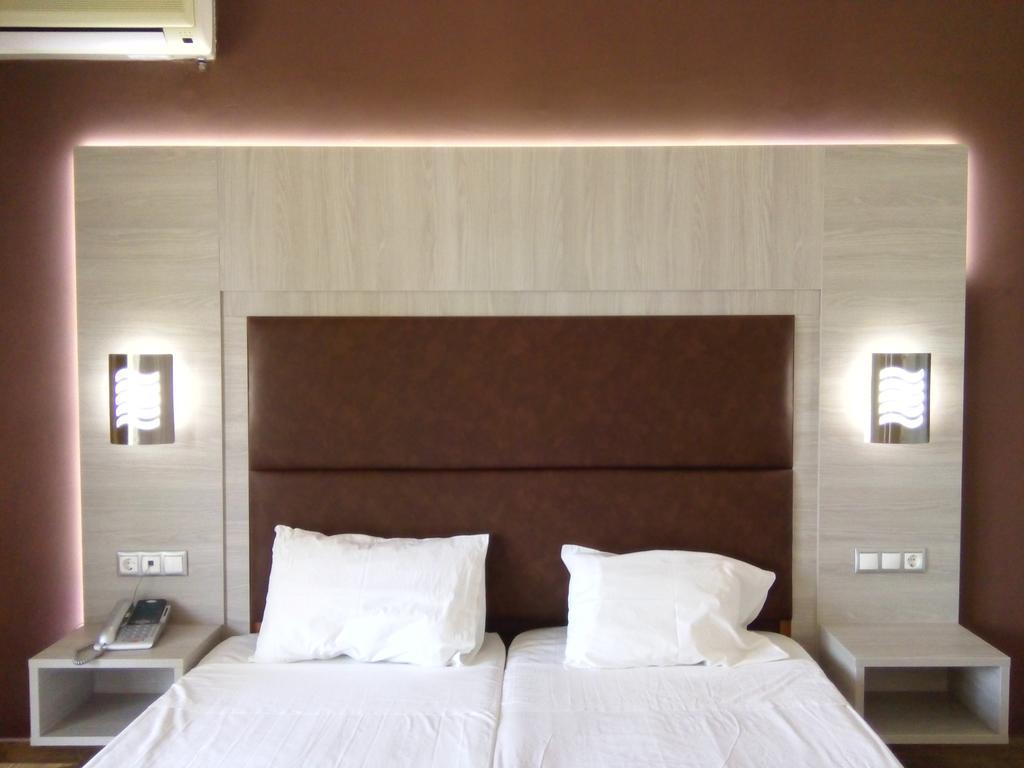 Karavos Hotel Apartments อาร์คานเยโลส ห้อง รูปภาพ