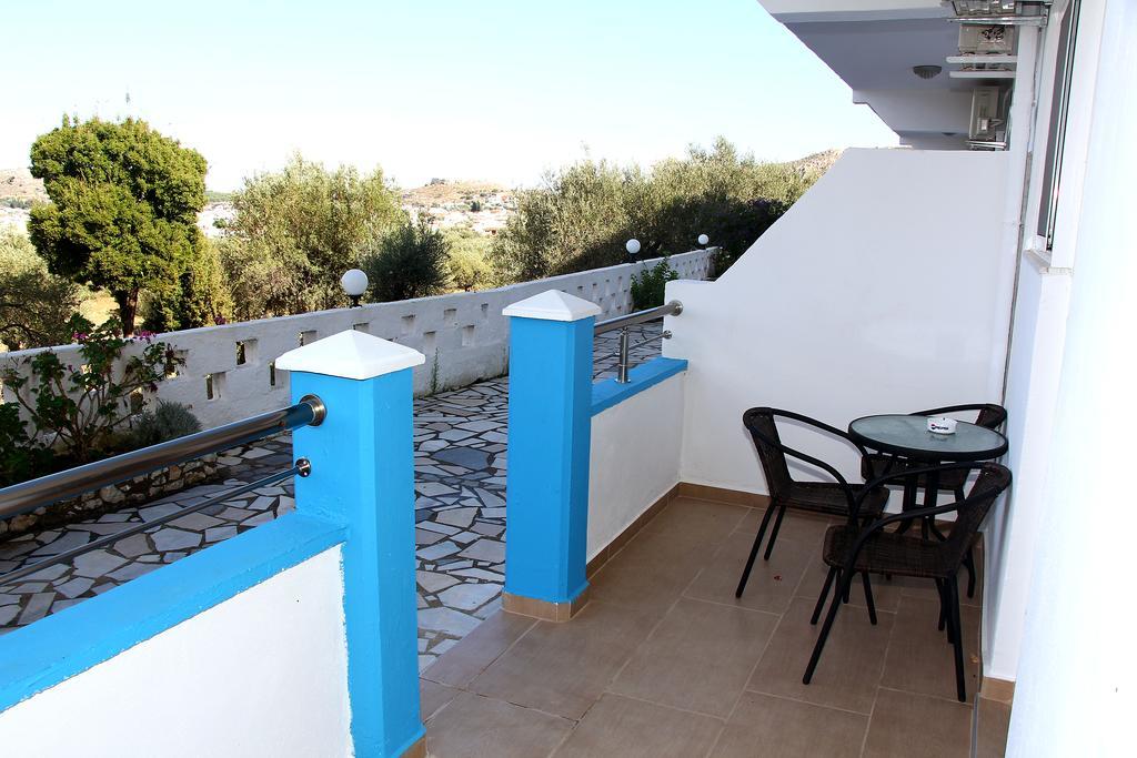 Karavos Hotel Apartments อาร์คานเยโลส ห้อง รูปภาพ