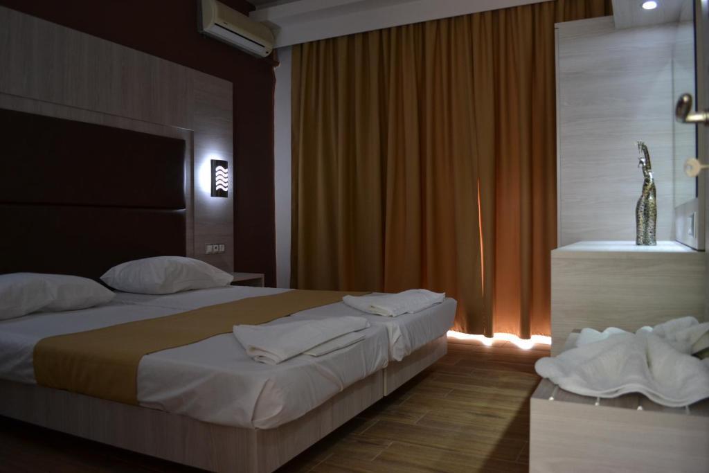 Karavos Hotel Apartments อาร์คานเยโลส ภายนอก รูปภาพ
