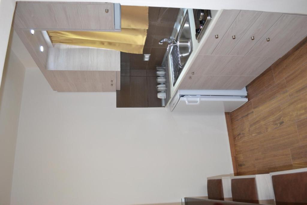 Karavos Hotel Apartments อาร์คานเยโลส ห้อง รูปภาพ
