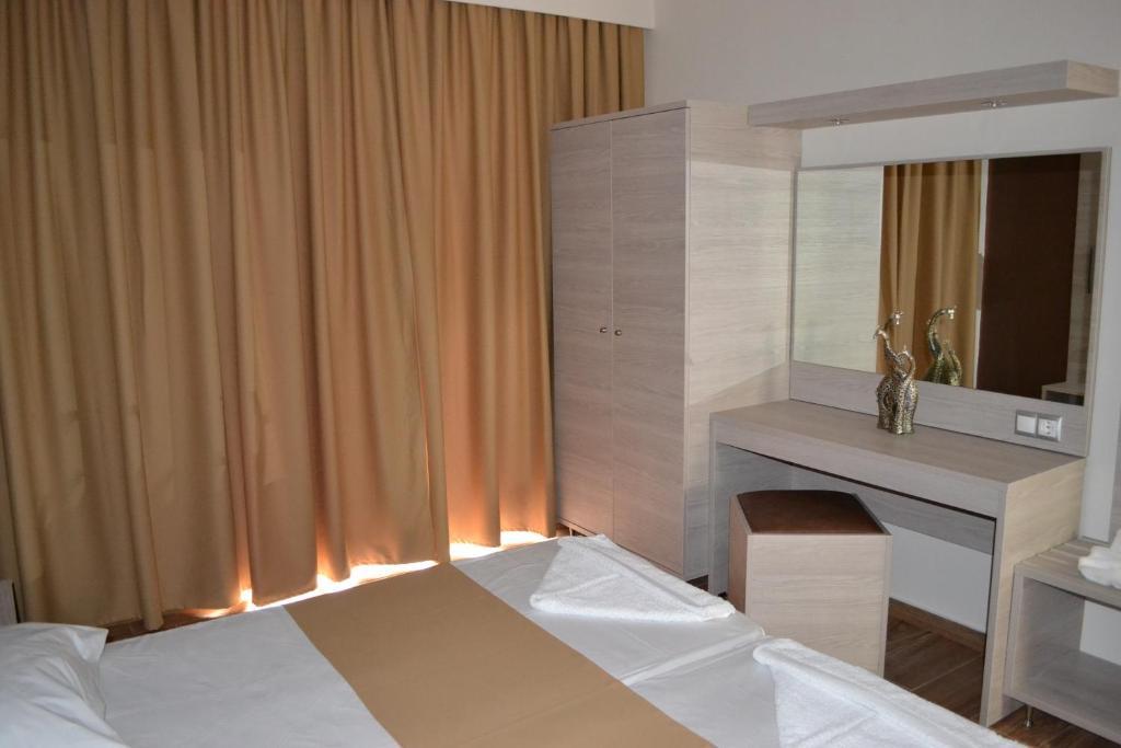 Karavos Hotel Apartments อาร์คานเยโลส ภายนอก รูปภาพ