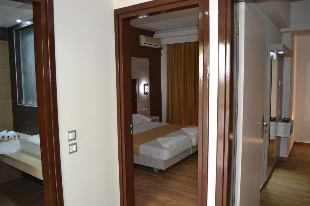 Karavos Hotel Apartments อาร์คานเยโลส ภายนอก รูปภาพ