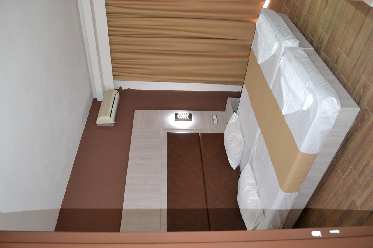Karavos Hotel Apartments อาร์คานเยโลส ภายนอก รูปภาพ
